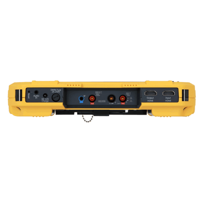 Dahua PFM907-E tester met gele behuizing, voorzien van HDMI-poorten, multimeter-aansluitingen en audio-ingang.