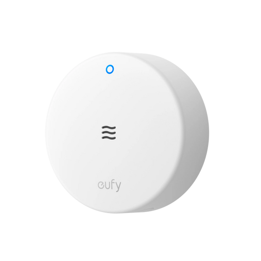 Witte, ronde Eufy water- en vorstsensor met blauw statuslampje en watergolf-icoon op een witte achtergrond.